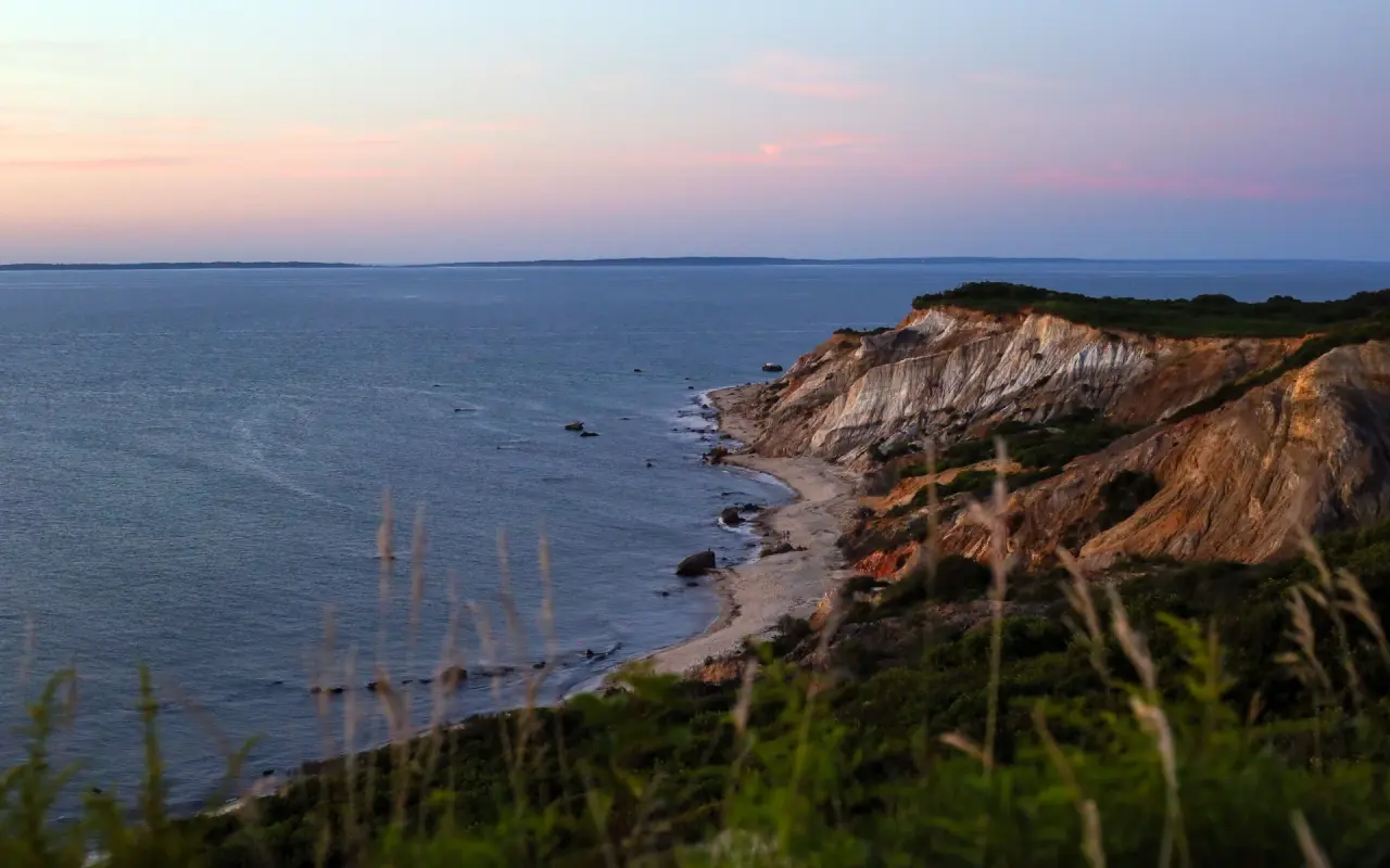 The clay cliffs at Aquinnah above the beach at dusk