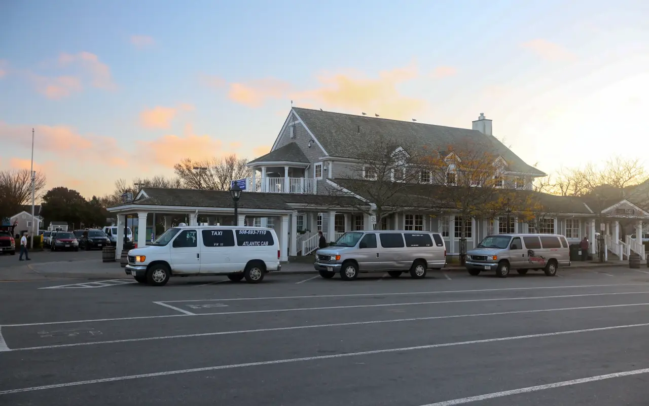 Taxi vans parked outside the Steamship Authority terminal in Vineyard Haven