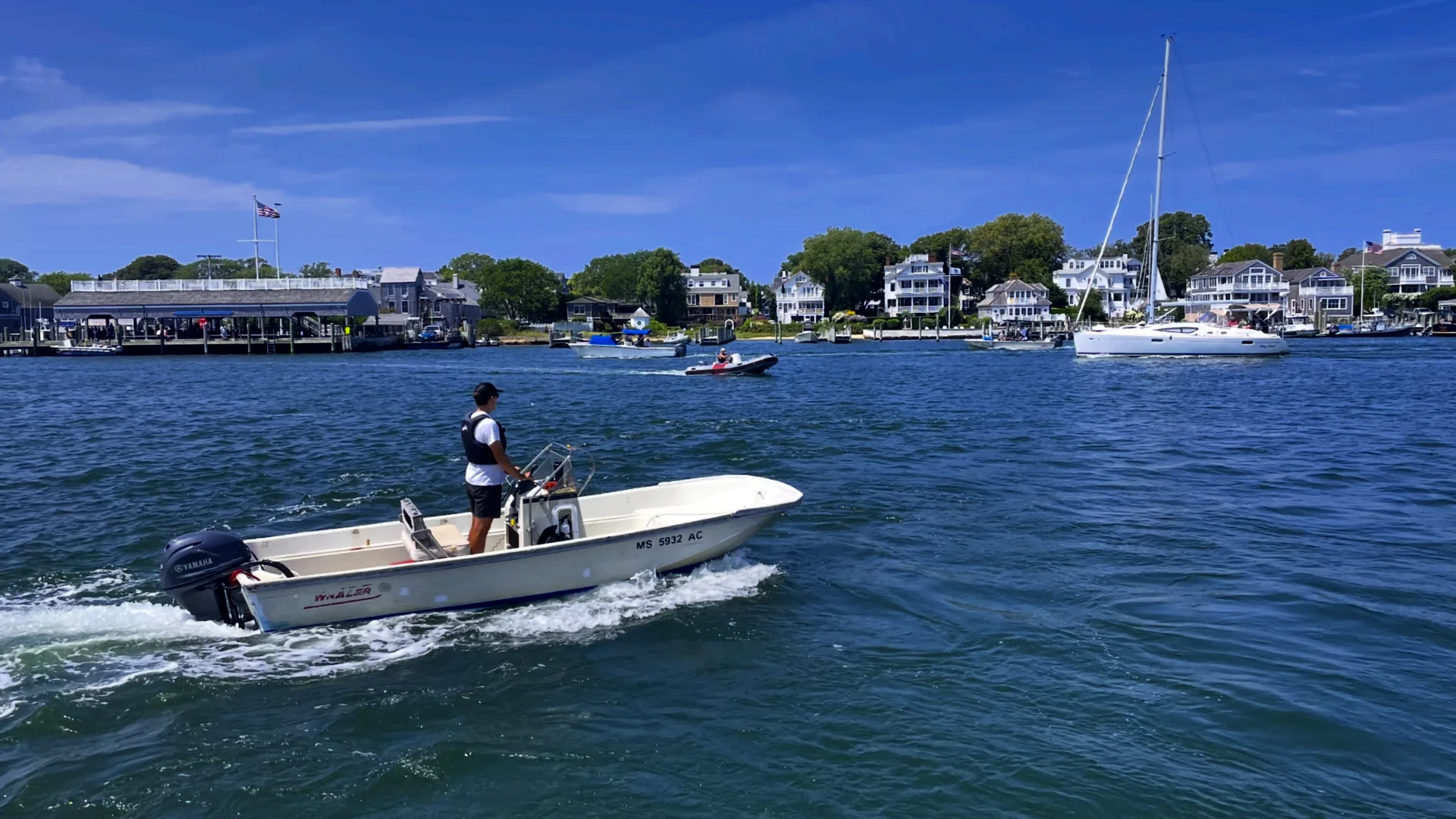 Boats in Edgartown Harbor with Chappaquiddick in the background