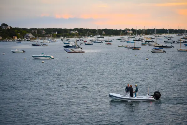 Moored boats in Edgartown harbor at sunset