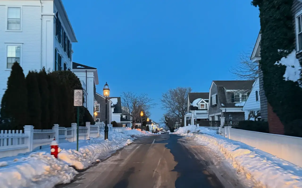 Snow-lined residential street in Edgartown in winter