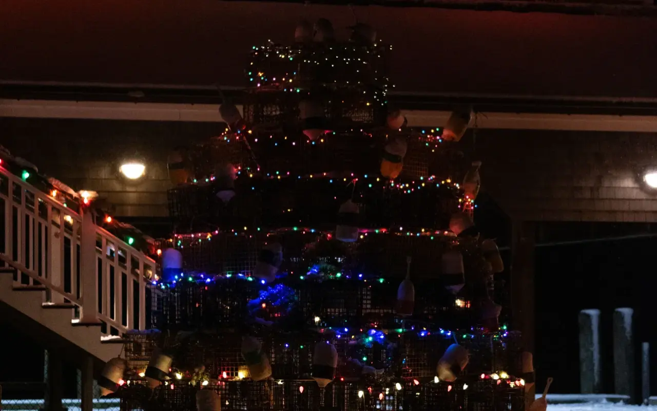 Christmas tree made of lobster traps and buoys with holiday lights on Memorial Wharf in Edgartown
