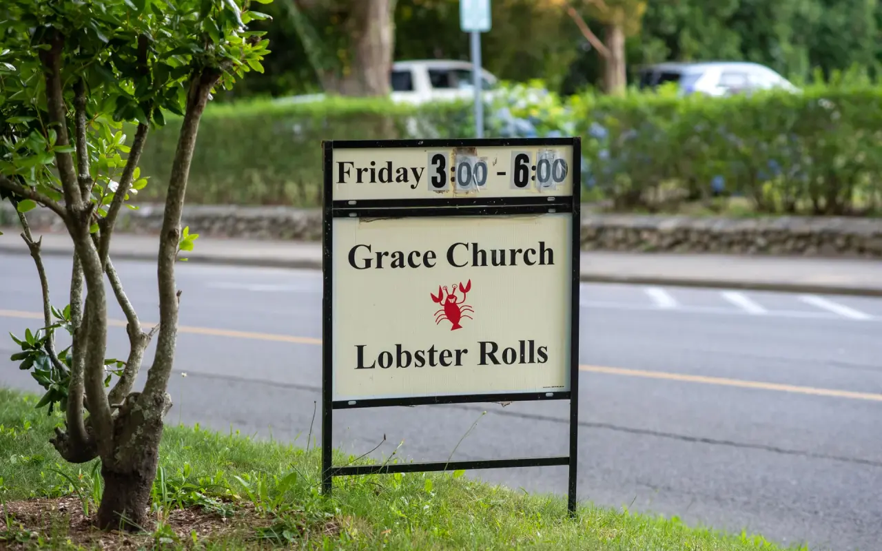 Grace Church lobster rolls sign on the lawn in Vineyard Haven