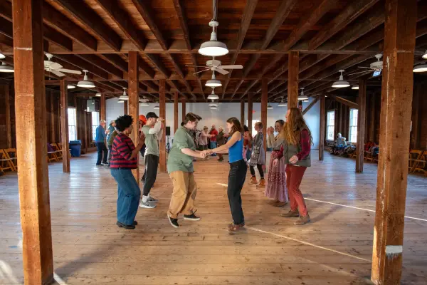 Dancers pairing up inside the Grange Hall in West Tisbury