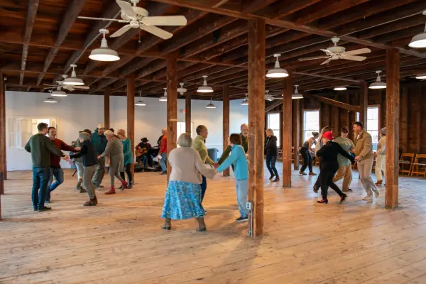 Community dance filling the Grange Hall floor in West Tisbury