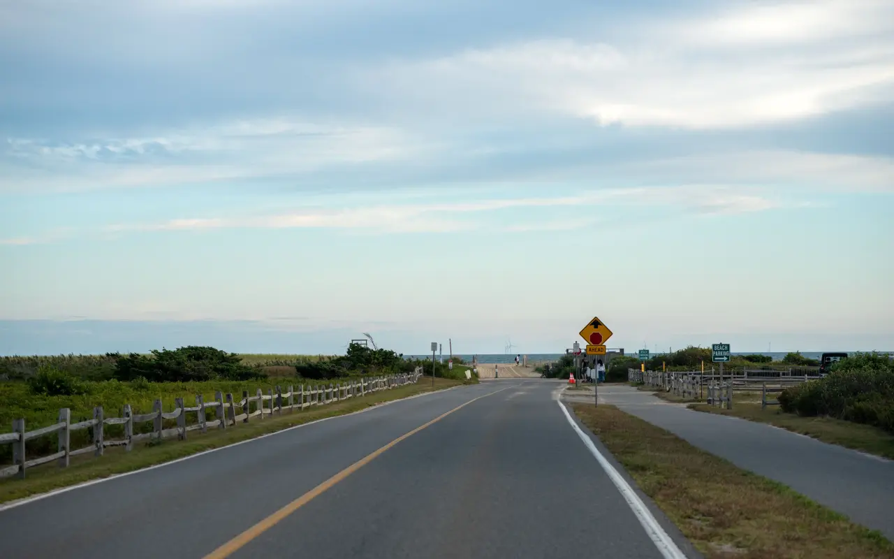 Katama Right Fork road sign pointing toward Edgartown with coastal views