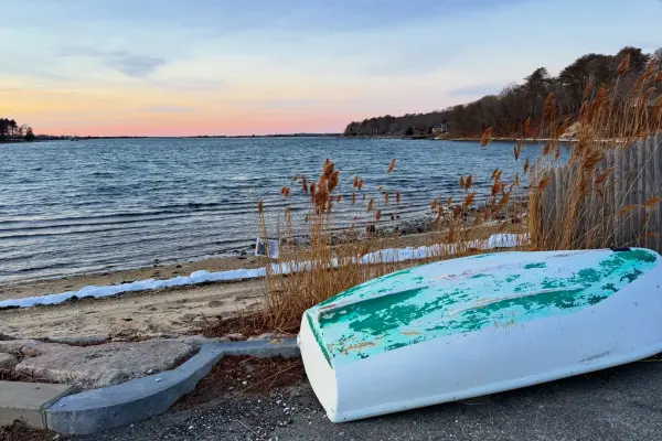 An overturned dinghy waits out the winter at Lake Tashmoo