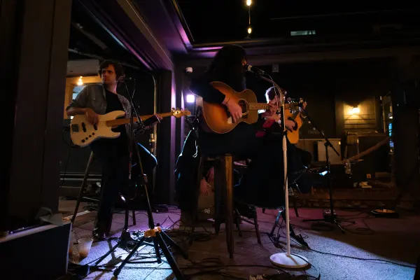 Maddi Ryan and her band on stage at the songwriters festival