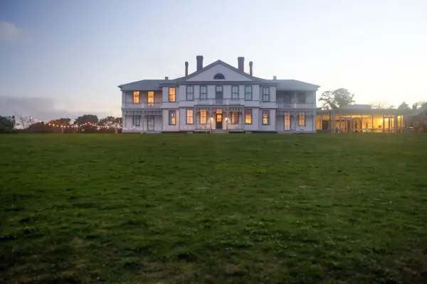 The Martha's Vineyard Museum across its lawn at dusk
