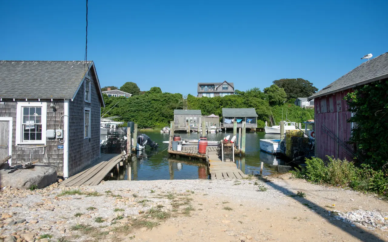 Menemsha harbor shacks and a small dinghy dock in summer