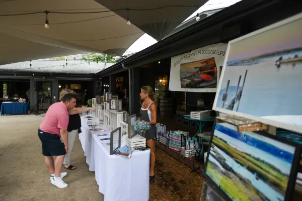 Natalie Hawkins Photography booth with prints on display at Nomans