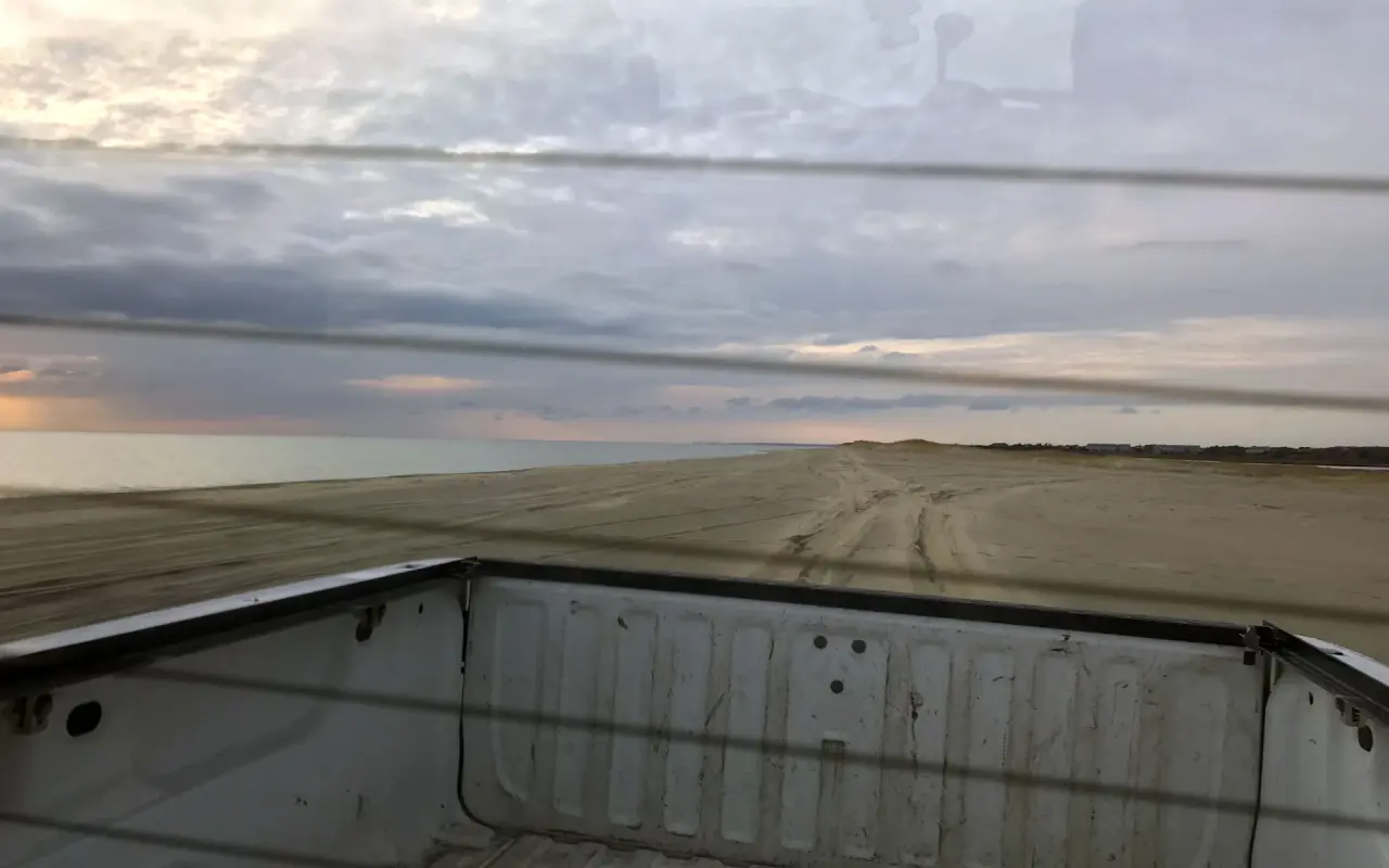 The view from a pickup bed parked on Norton Point Beach