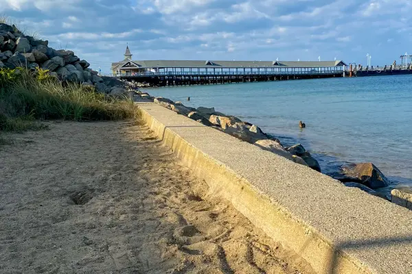 The seawall and fishing pier along Oak Bluffs town beach