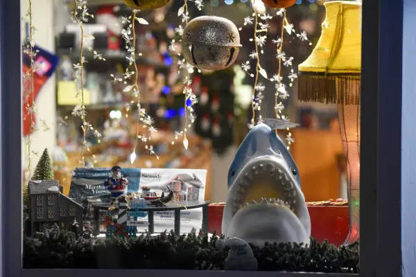 Holiday shop window display with a great white shark head
