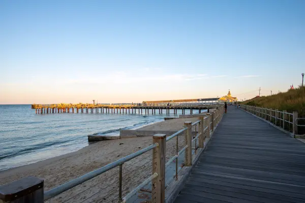 Boardwalk along the beach leading toward the Oak Bluffs pier