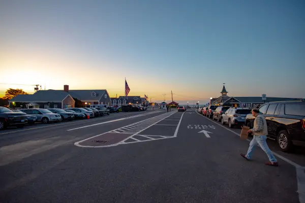 Parked cars near the Oak Bluffs waterfront at sunset