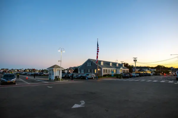 Dusk settles over the parking area near the ferry landing