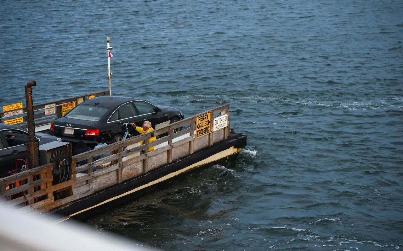 The On Time III Chappy ferry crossing with a car aboard