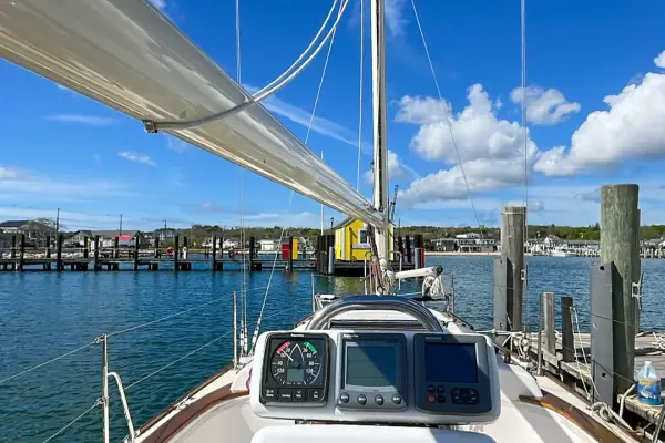 Cockpit view from a sailboat's deck near the harbor docks
