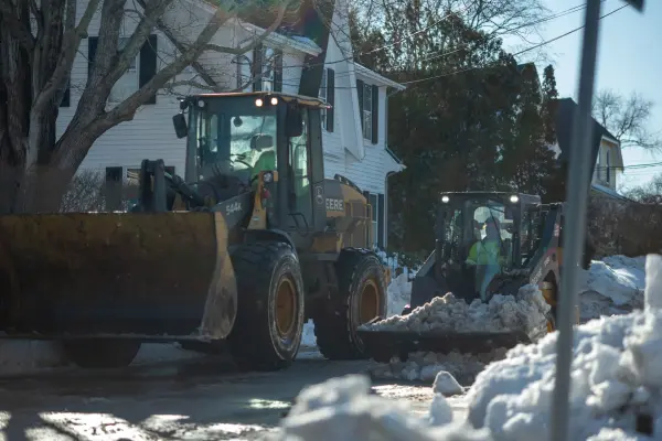 Loaders hauling snow from a Vineyard Haven neighborhood street