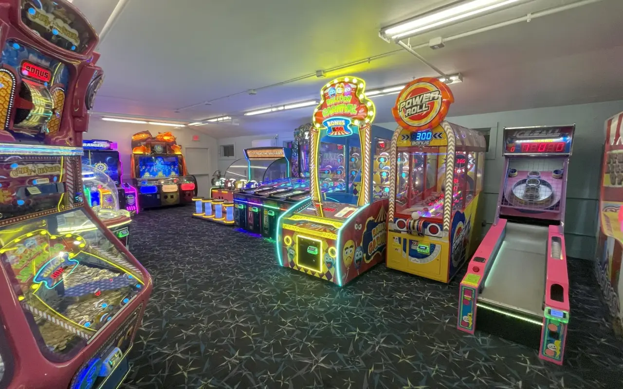 Rows of arcade games and skee-ball lanes inside Ryan Family Amusements in Oak Bluffs