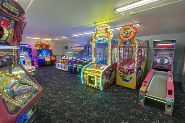 Skee-ball and claw machines inside the Oak Bluffs arcade