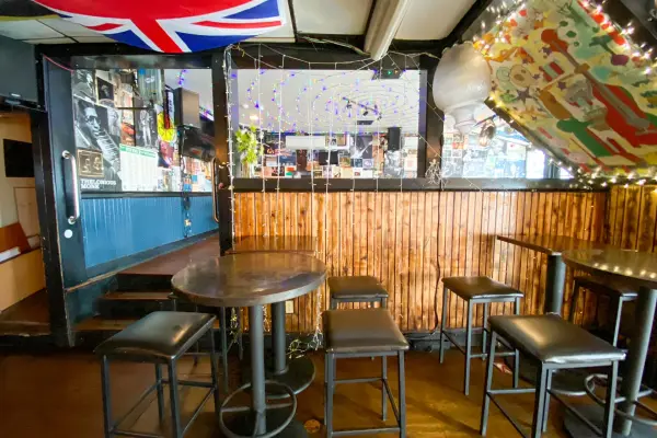 Inside the Ritz: low light, close quarters, the island's iconic dive bar.