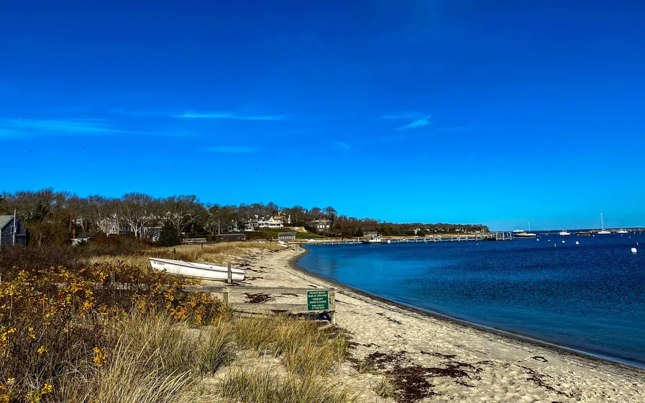 The town beach in Vineyard Haven with harbor boats beyond
