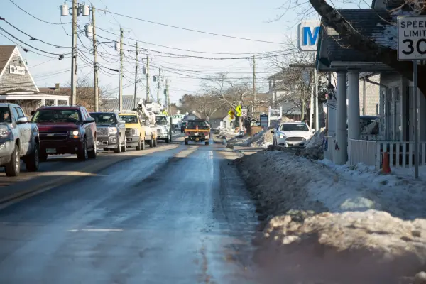 Winter traffic and plowed snow near Five Corners, Vineyard Haven