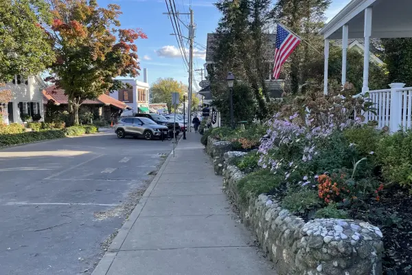 Stone-edged flower gardens along a Vineyard Haven sidewalk