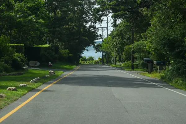 Quiet West Chop road with water view ahead