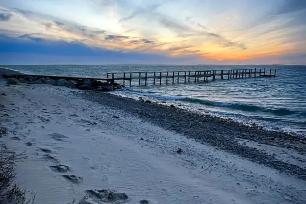 Dusk colors over the long pier at West Chop