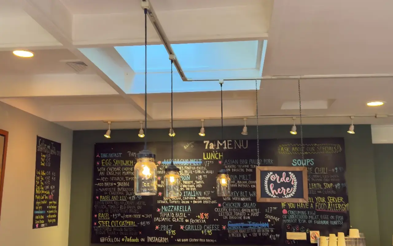 Counter and chalkboard menu board inside 7a Foods in West Tisbury