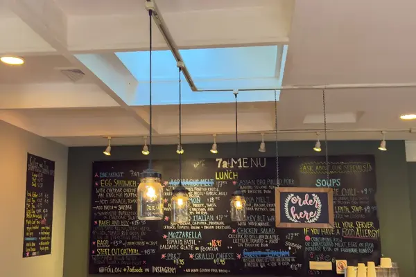 7a Foods counter and chalkboard menu in West Tisbury