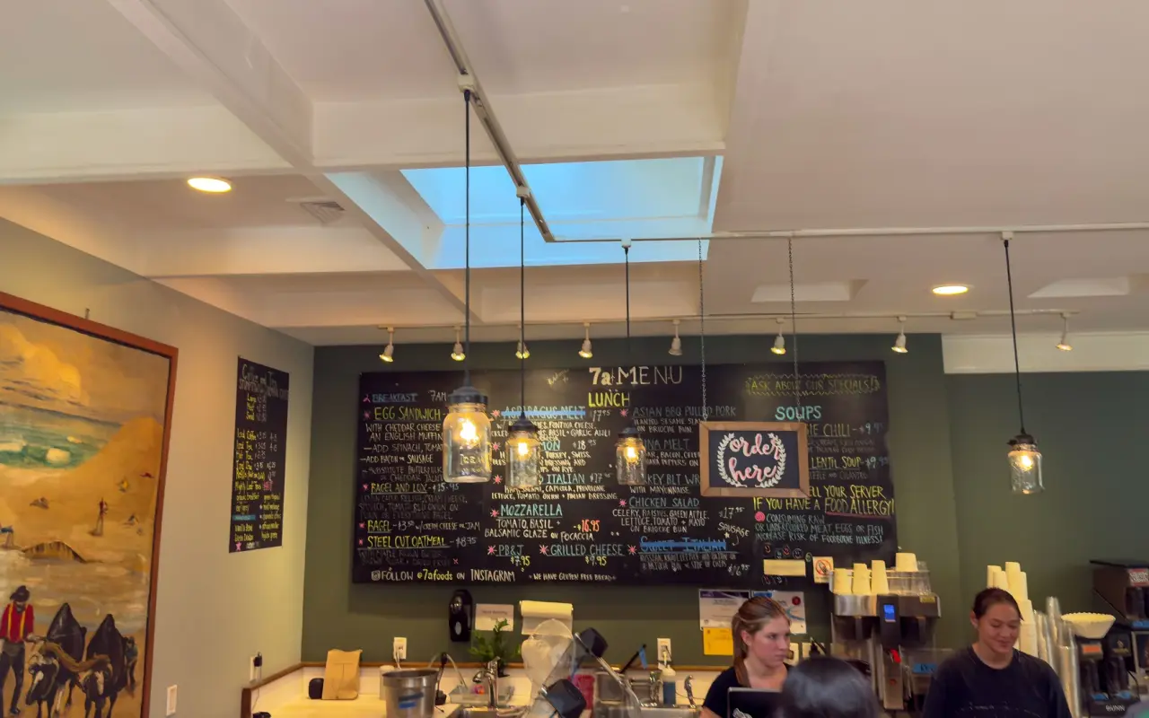 Menu chalkboard and counter inside 7a Foods in West Tisbury