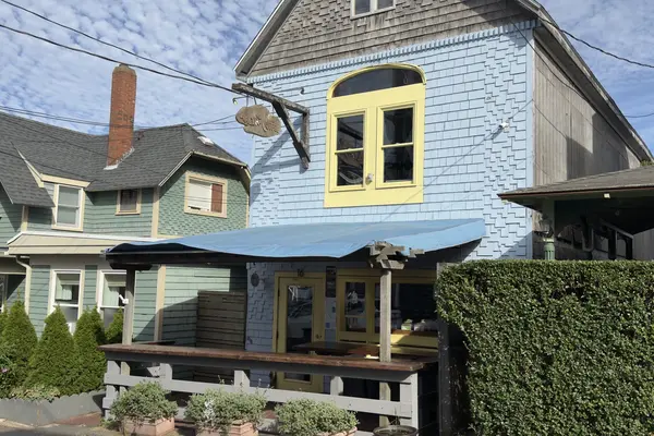 Aalia's Coffee at 16 Kennebec Avenue, blue shingles and yellow trim