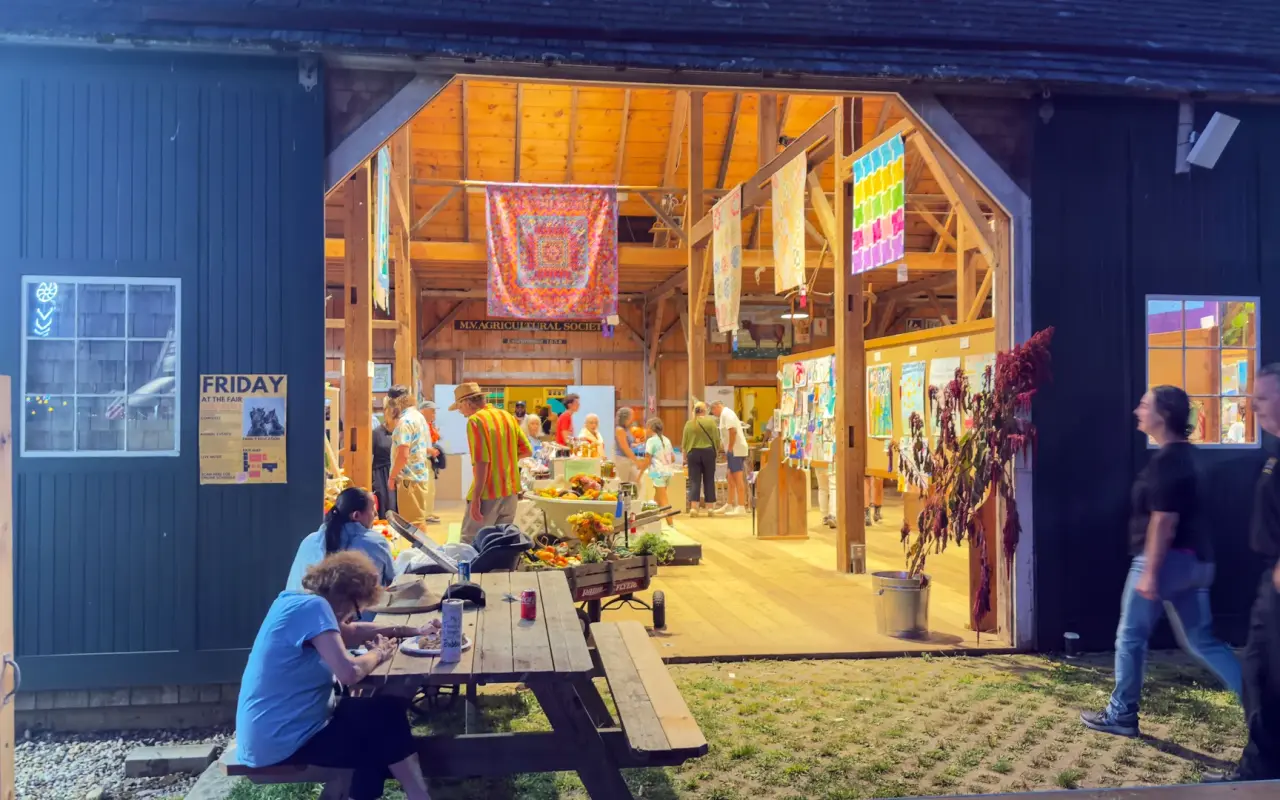 Agricultural Hall lit up in the evening during the 2026 fair in West Tisbury on Martha's Vineyard