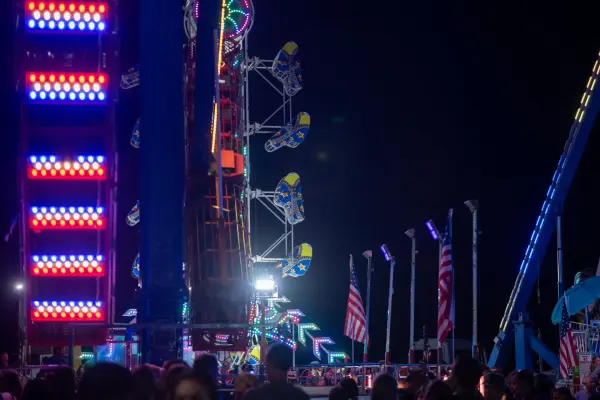 Ride towers and American flags light up the West Tisbury night