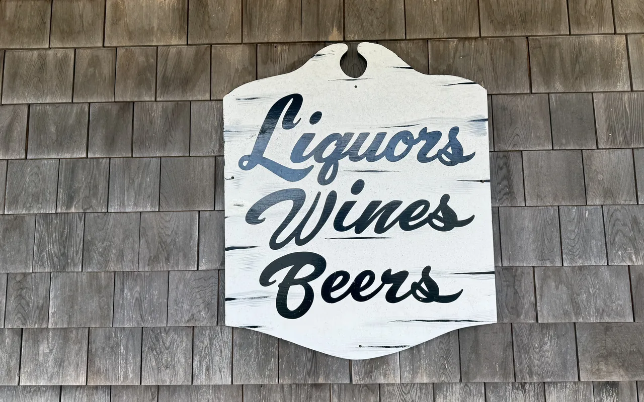 Hand-painted Liquors Wines Beers sign at Al's Package Store in Edgartown