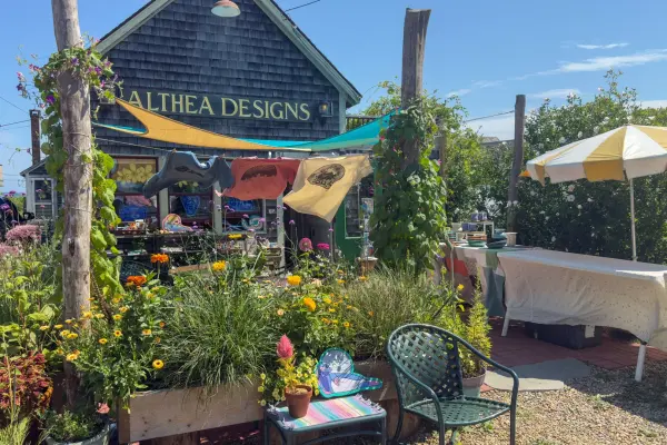 Garden seating in full bloom outside Althea Designs