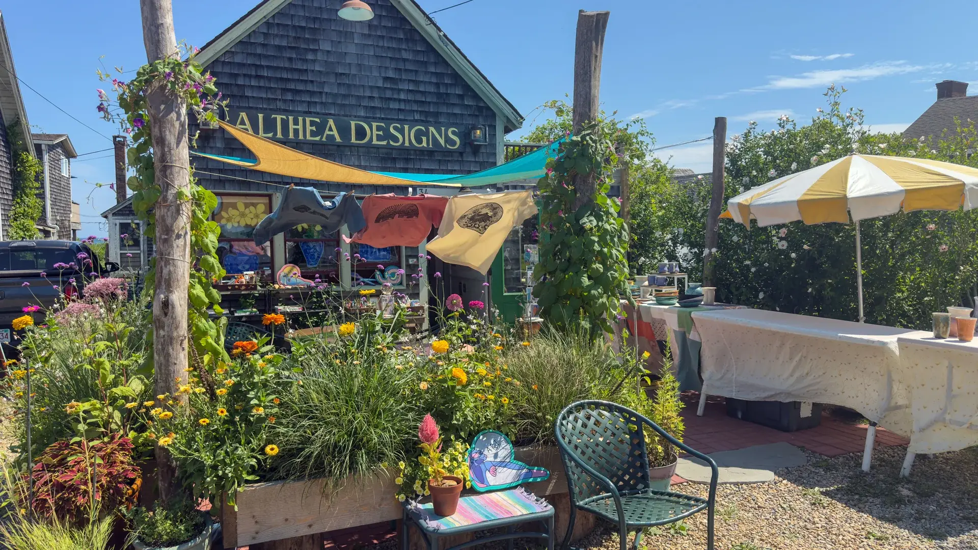 Garden seating in full bloom outside Althea Designs