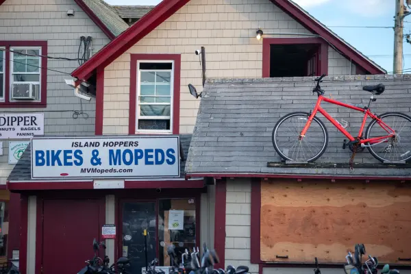 Island Hoppers with a spare bike parked on the roof