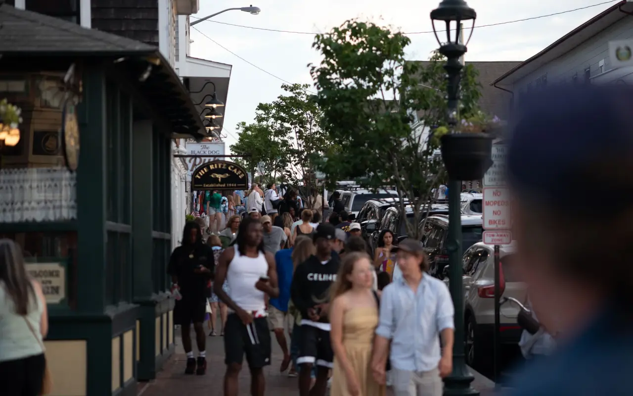 Crowds walking Circuit Avenue in Oak Bluffs past the Ritz Cafe sign