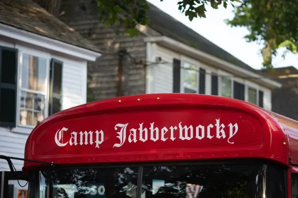 Camp Jabberwocky's signature red bus in the Edgartown Fourth of July parade