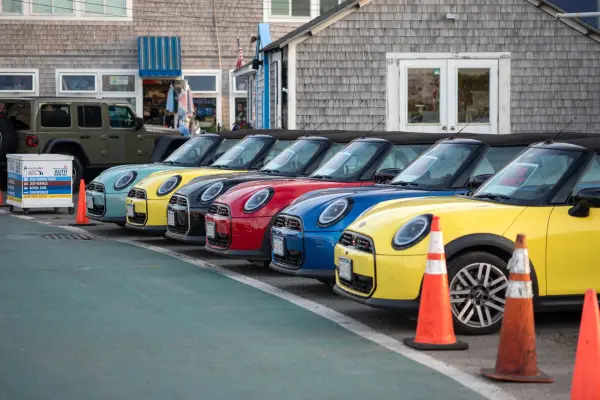 Minis in every color waiting by the harbor