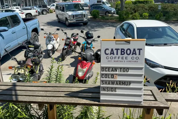 Mopeds lined up outside Catboat Coffee Co.