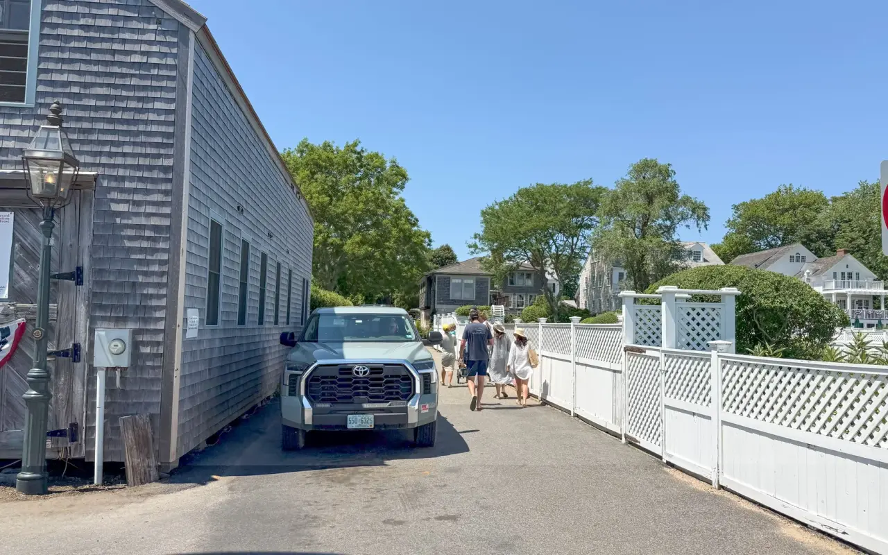 Summer line of cars and walk-ons for the Chappy Ferry on Dock Street in Edgartown