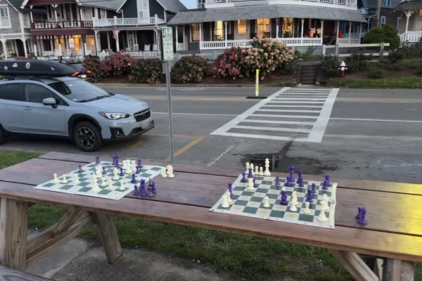 Chess boards on a picnic table at dusk, Oak Bluffs