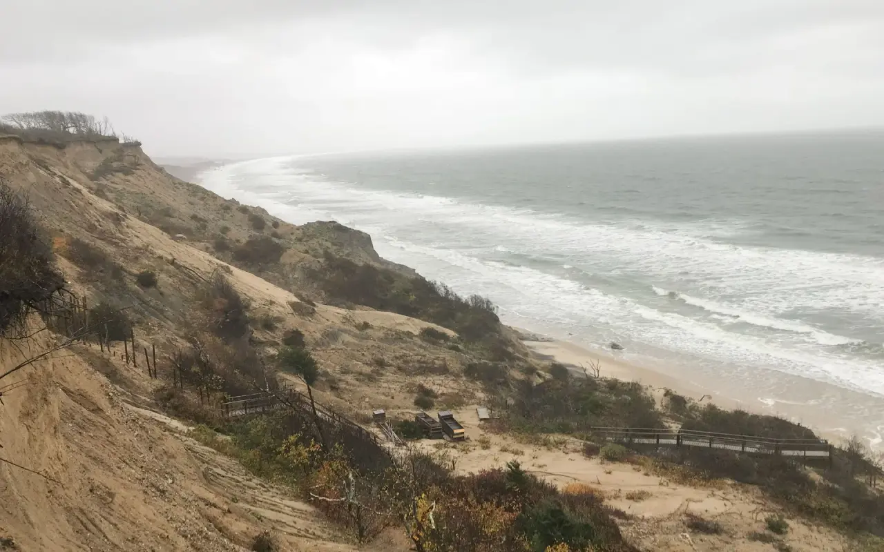 Eroding sand cliffs above the Atlantic surf on the Chilmark shore
