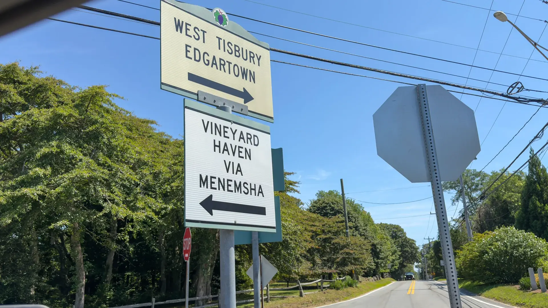 The up-island signpost: West Tisbury and Edgartown one way, Vineyard Haven via Menemsha the other